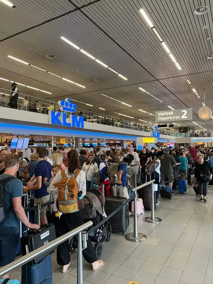 Long passport control queue at Paris Charles de Gaulle airport in 2026